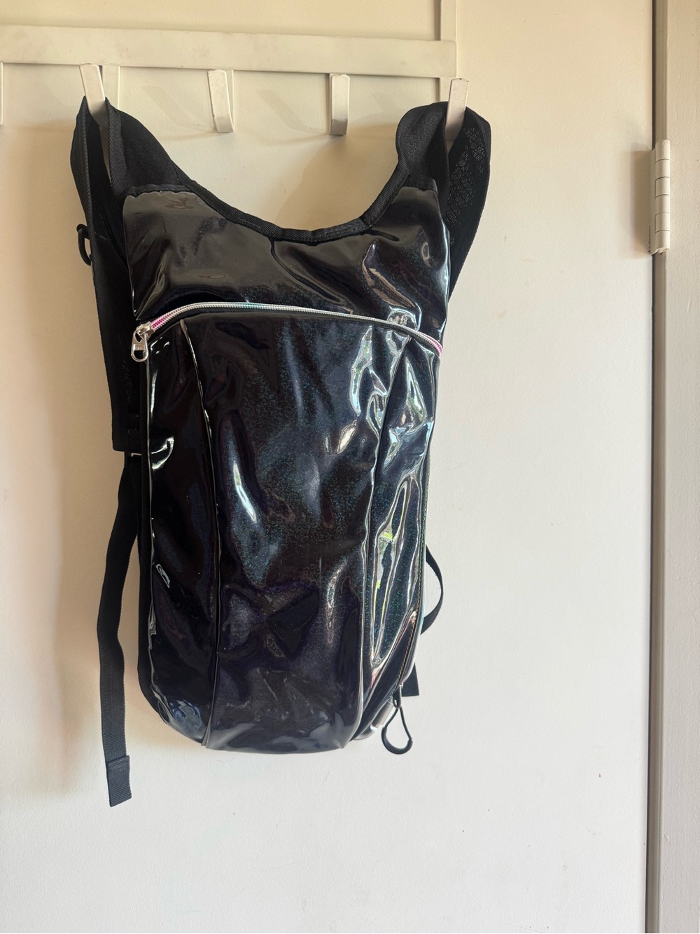 Black Glossy Sling Backpack - Good condition Size L8x H15 inches